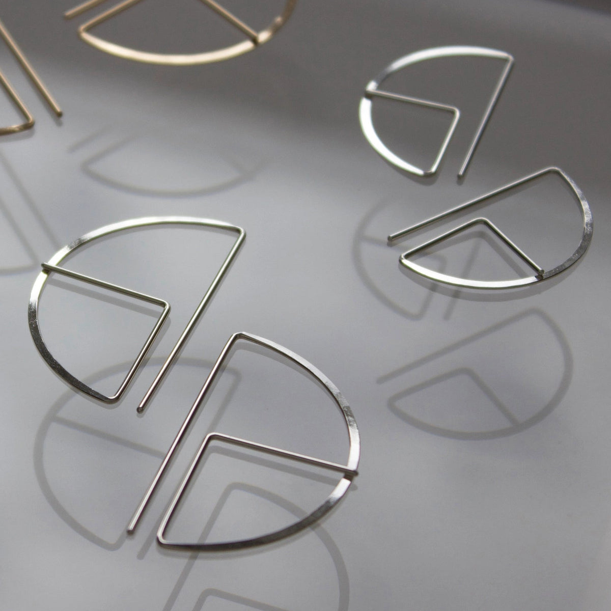 Profile earrings lg