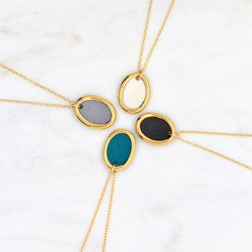 GOLD RIMMED OVAL NECKLACE